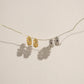 Lily Huggie Hoop Earrings - Earrings